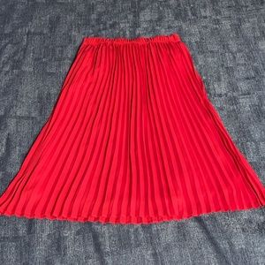 Red pleated skirt